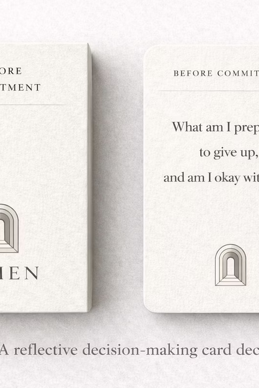 LIMEN Threshold deck open on a soft surface, showing 'Before Commitment' card prompts.